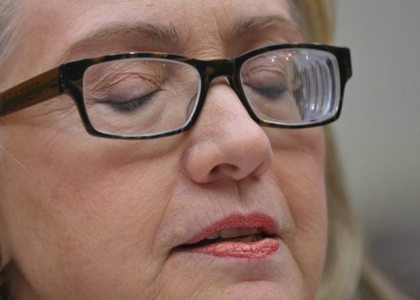 Hillary Clinton wears special glasses designed to help people with brain damage